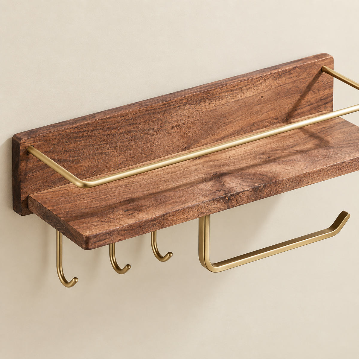 Brown solid wood floating shelf with gold-tone rail and two side hanging hooks
