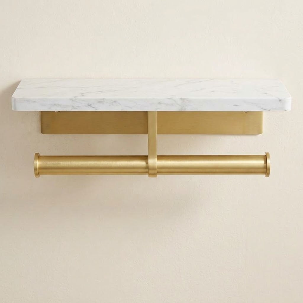 Marble-look toilet roll holder with double cylindrical brushed gold bars and white shelf