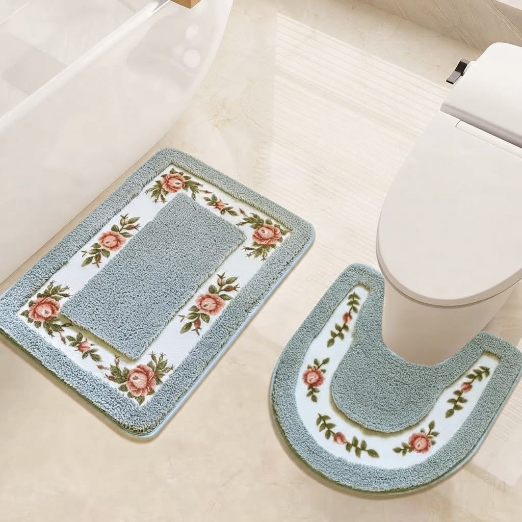 Floral non-slip bath mat set in blue with rectangular rug and U-shaped toilet mat