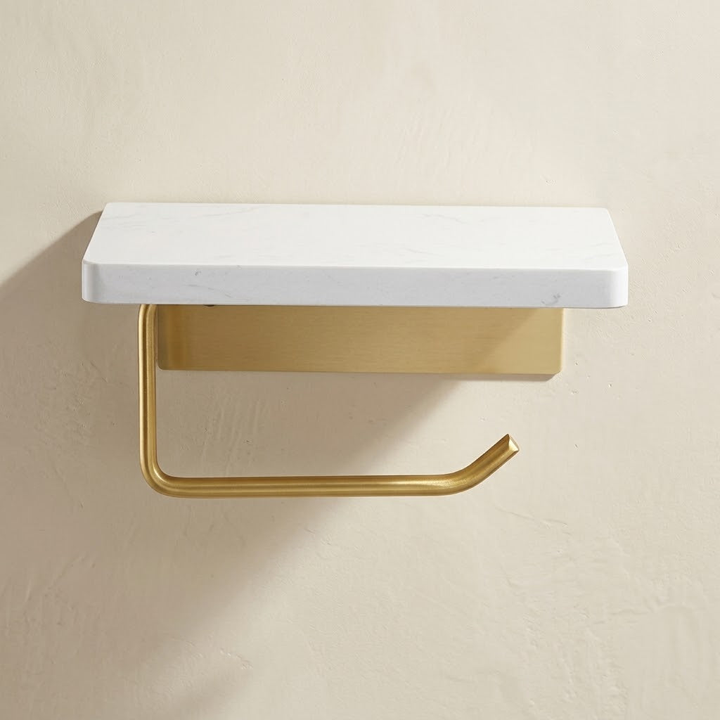 Marble-look toilet roll holder with curved brushed gold arm and white top ledge