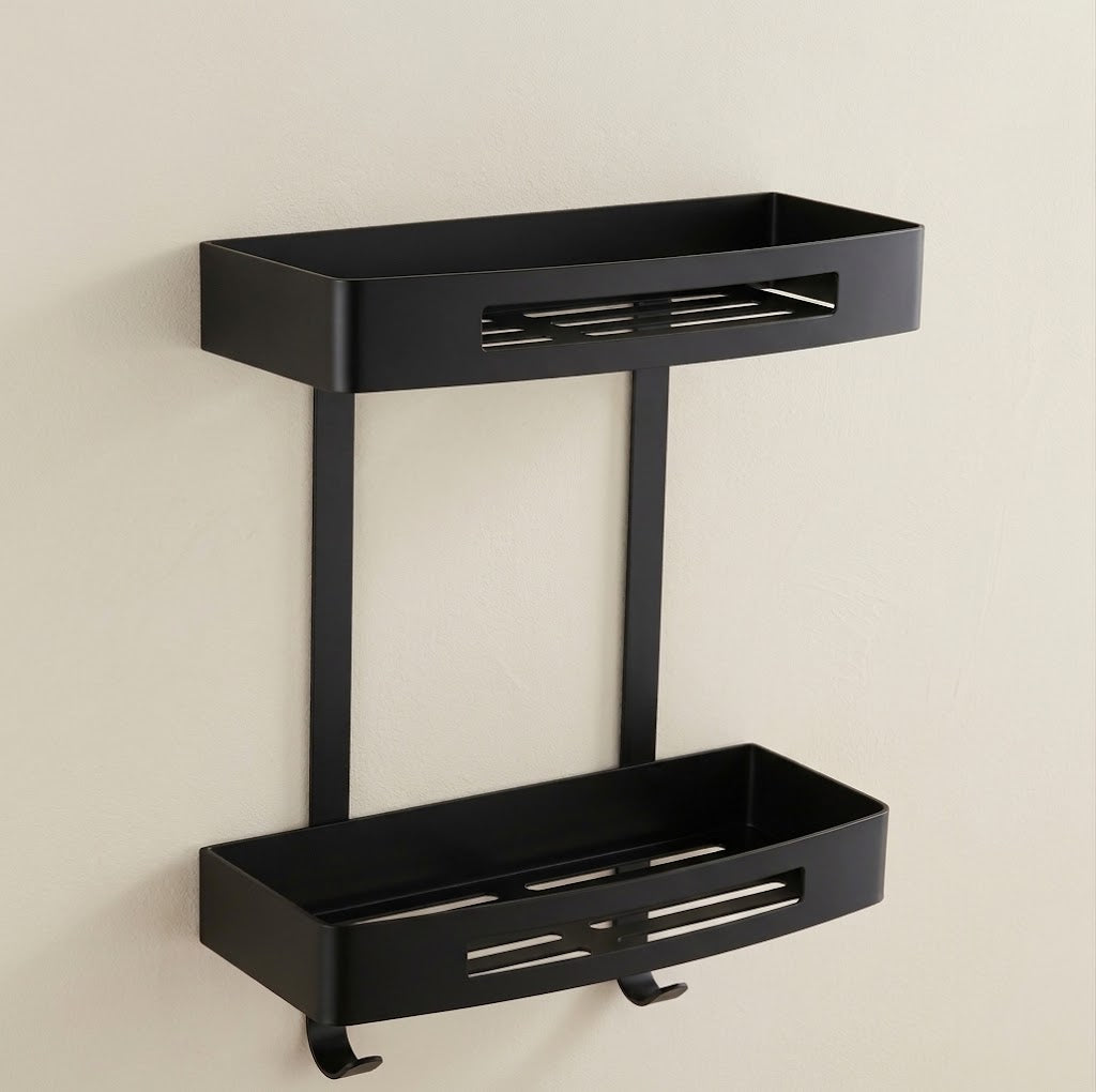Black stainless steel wall shower caddy with two stacked trays and hanging hooks.