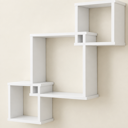 White wall-mounted cube shelf set with three staggered open cubbies