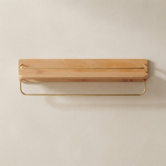 Light natural wooden floating wall shelf with brass towel bar, horizontal plank.
