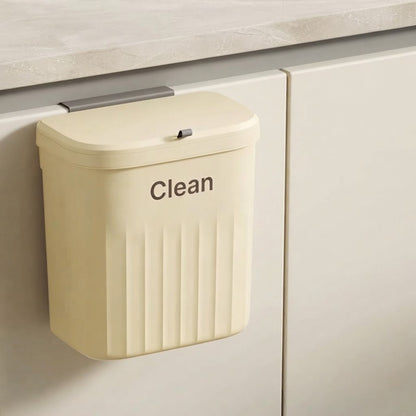 Beige two-way hanging cupboard door bin with ridged side panels and “Clean” label