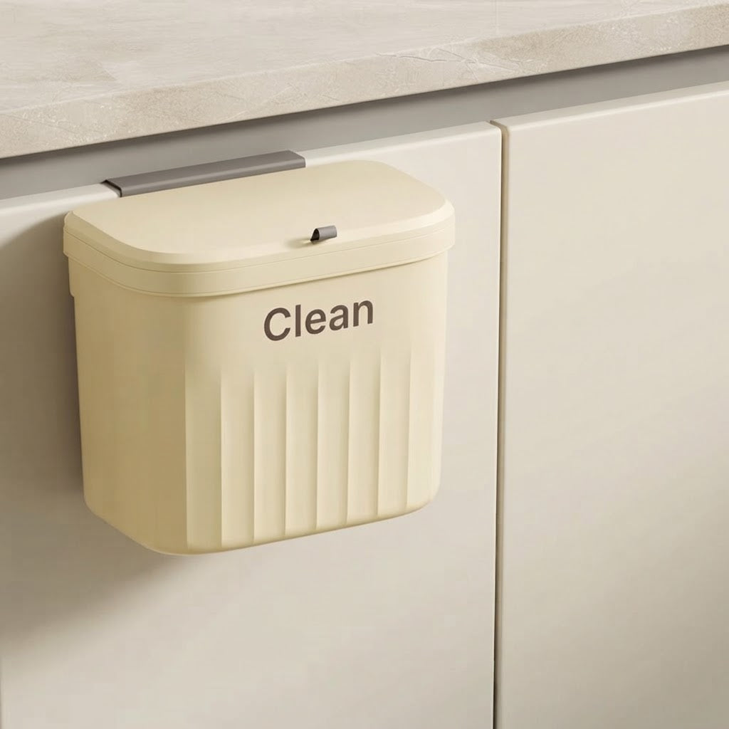 Beige two-way hanging cupboard door bin with hinged lid closed and “Clean” label