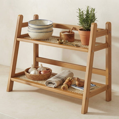 Bamboo 2-tier countertop rack with open shelves and decorative kitchenware