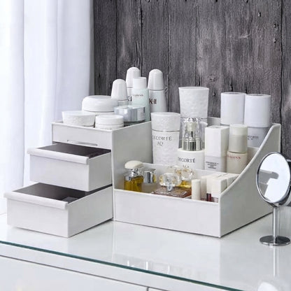 White stepped makeup organizer with tiered compartments and a flip mirror stand