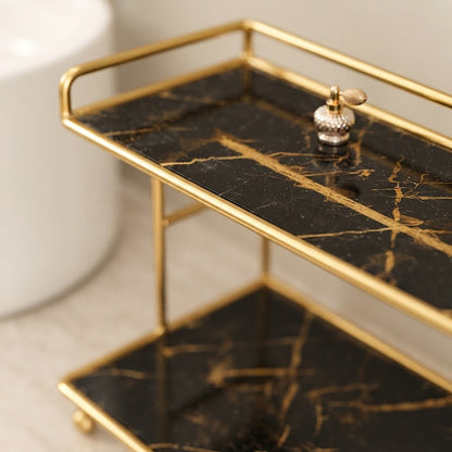 Gold-framed 2-tier organizer with black marble-look top tray and knob detail