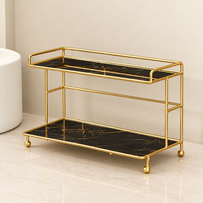 2-tier bathroom countertop organizer with gold guardrails and black marble-look trays