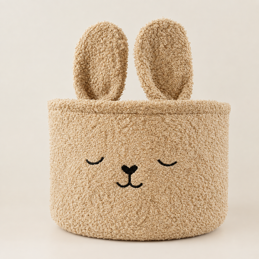 Beige plush bunny nursery storage basket with smiling face and raised ears