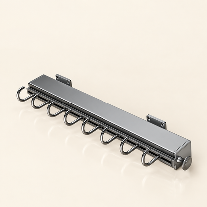 Grey pull-out sliding hook rail with curved hooks and end caps, shown on a flat surface