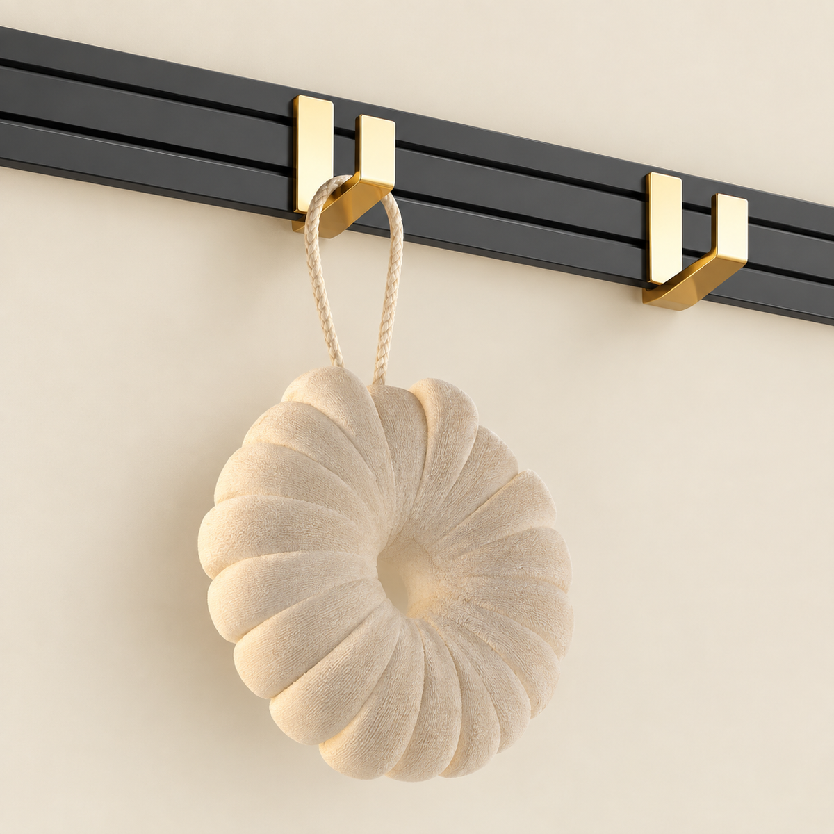 Wall-mounted towel rack end hook with gold holder on black bar