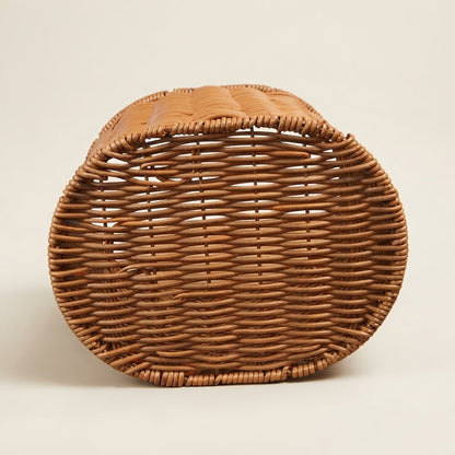 Closed woven faux rattan round picnic basket with arched handle and woven lid