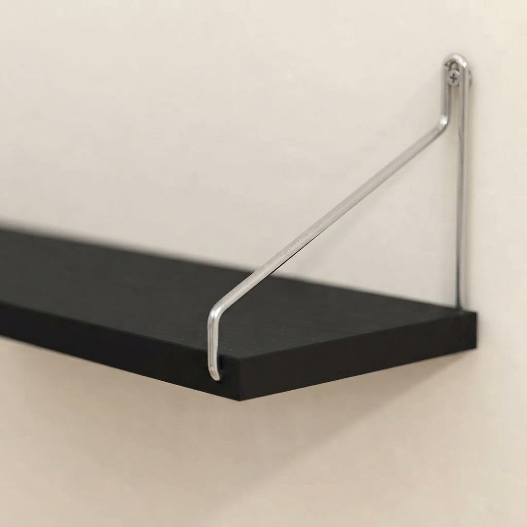Black floating wall shelf with U-shaped metal bracket and visible corner mount hardware
