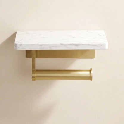 Marble-look toilet roll holder with cylindrical brushed gold bar and white wall shelf