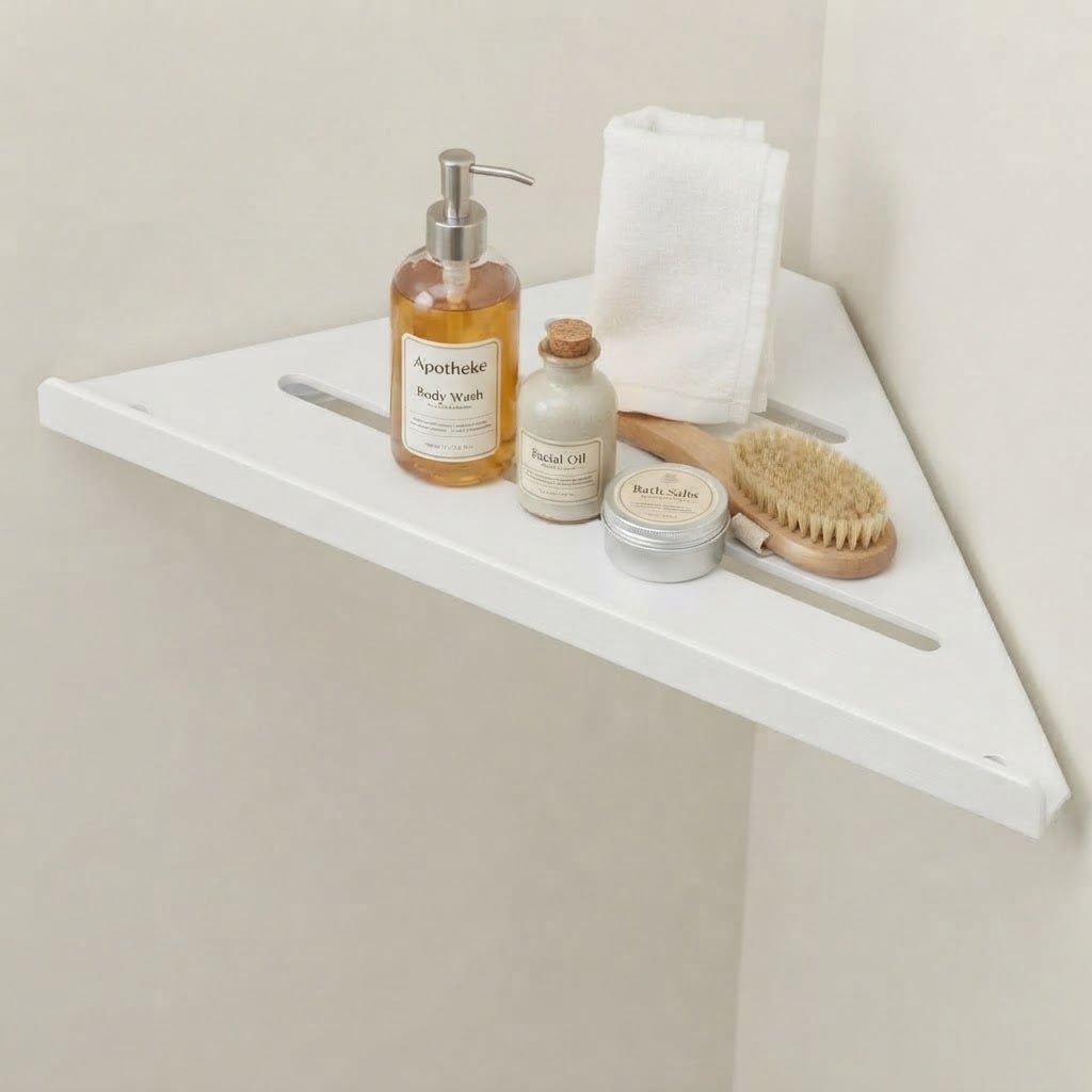 White stainless steel slatted corner shelf with three bar openings.