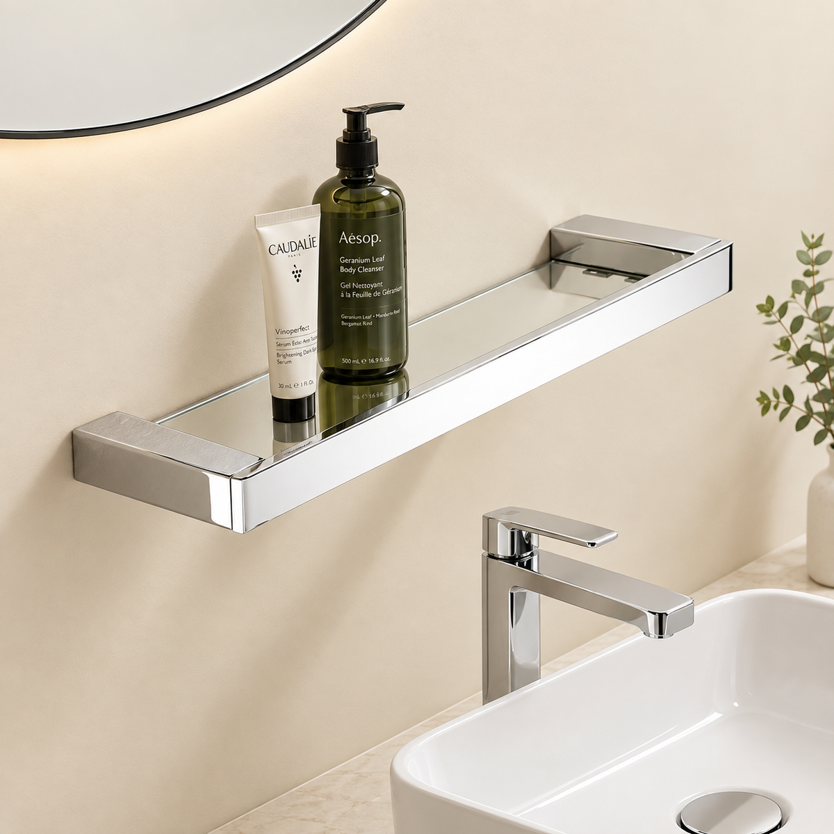 Kilor floating glass shelf holding toiletries on clear glass with stainless frame