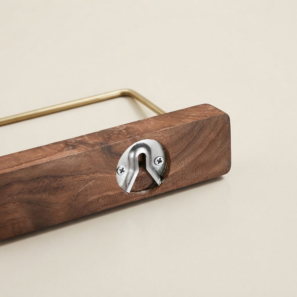 Brown solid wood shelf end detail with metal mounting plate and engraved screws