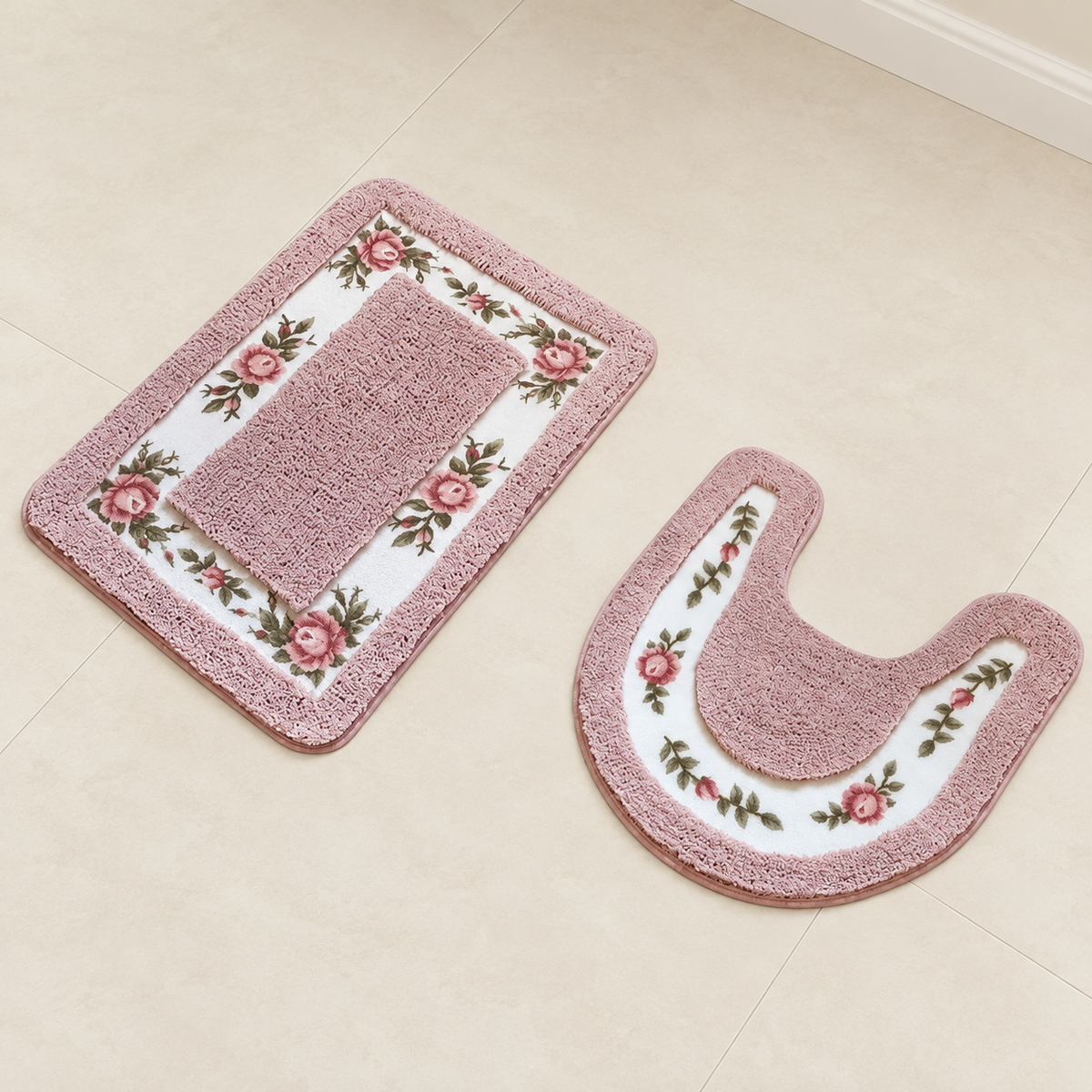 Floral non-slip bath mat set in pink with rectangular rug and U-shaped toilet mat