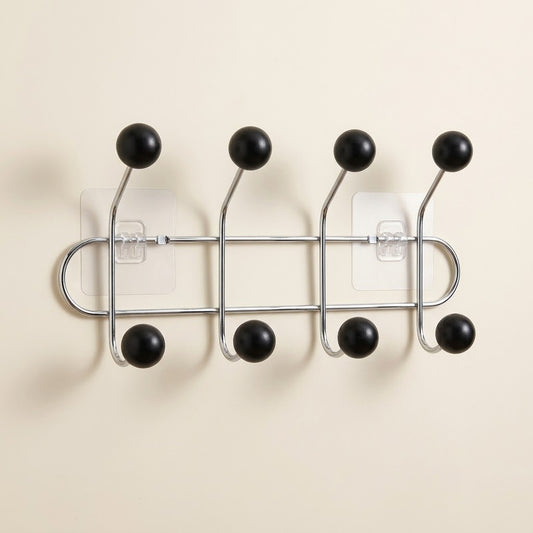 Self-adhesive coat rack with 4 black ball hooks on chrome bar and clear mounting pads