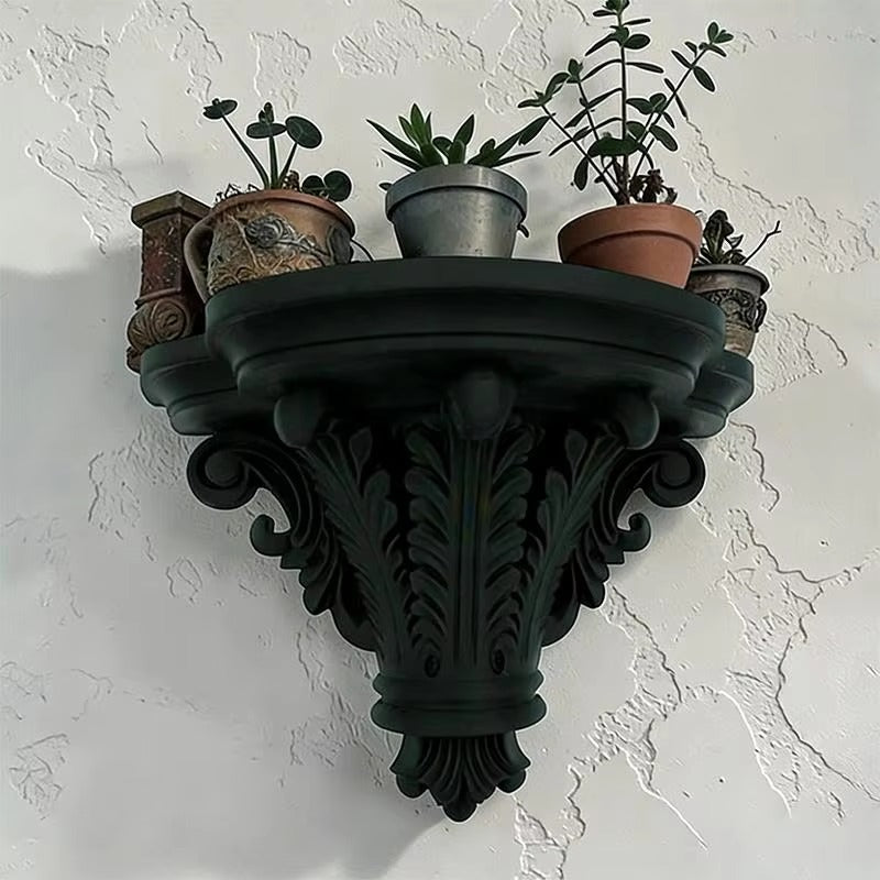 Black sculpted corbel floating shelf with round top plate and vine-like carving