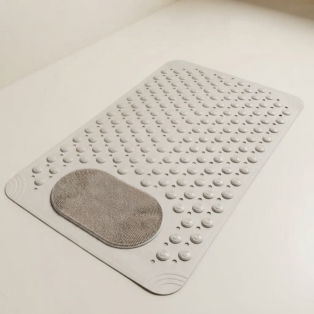 Non-slip shower mat with foot scrubber, light grey textured bumps and oval mesh pad