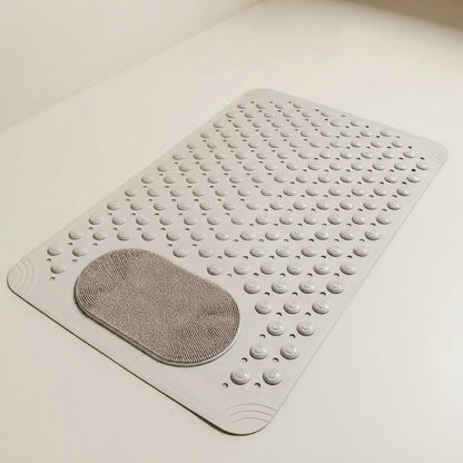 Non-slip shower mat with foot scrubber, light grey textured bumps and oval mesh pad