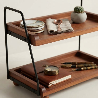 Two-tier kitchen worktop rack with dark wooden shelves and black metal sides