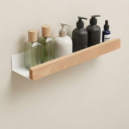 Wall-mounted beech wood ledge shelf with white back panel, displaying skincare bottles