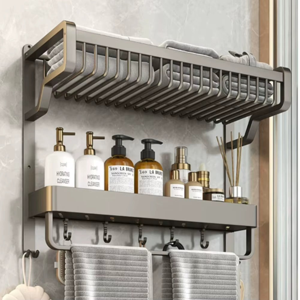 Wall-mounted aluminum bathroom shelf with towel bar, bottle ledges, and hooks