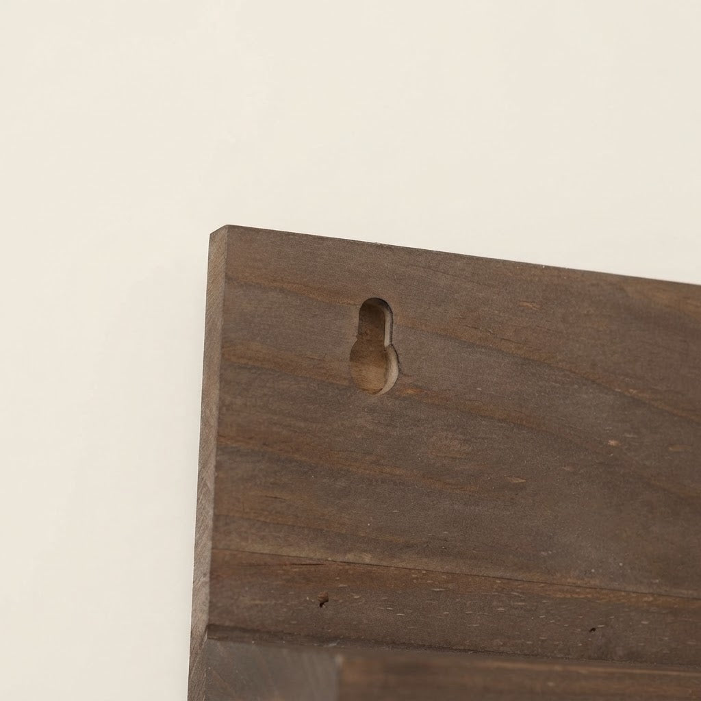 Walnut wooden floating shelf with scalloped edge and keyhole wall-mount cutout