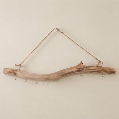 Driftwood multi-hook rail with rope hanger and loop-style metal hooks along the branch