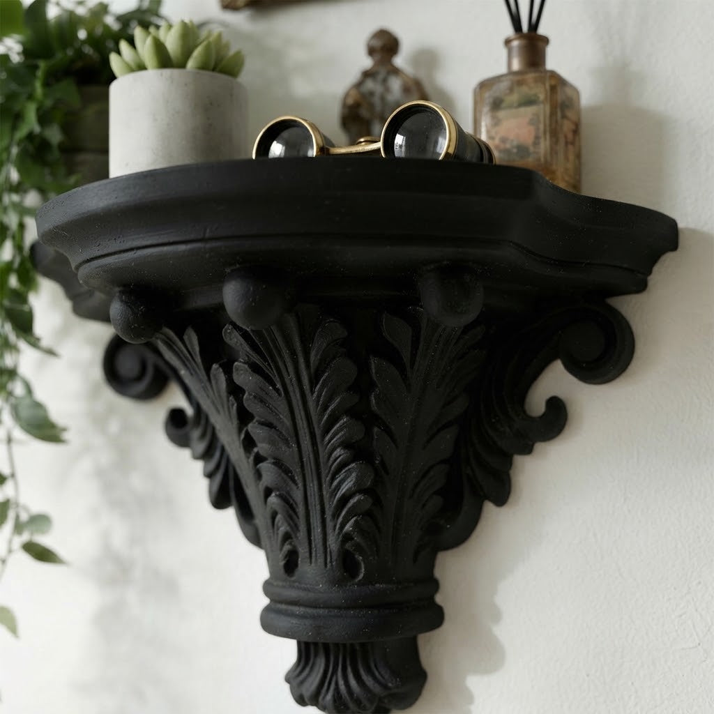 Black carved corbel floating shelf with round top and detailed scroll edges