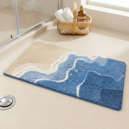 Fowey beach wave microfibre non-slip bath mat with coastal wave pattern, blue and off-white