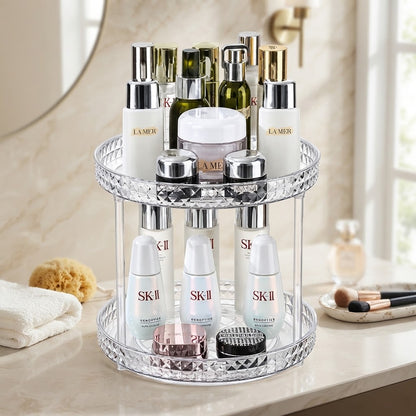 Rotating makeup organizer with two stacked clear tiers and mirrored diamond-pattern edge