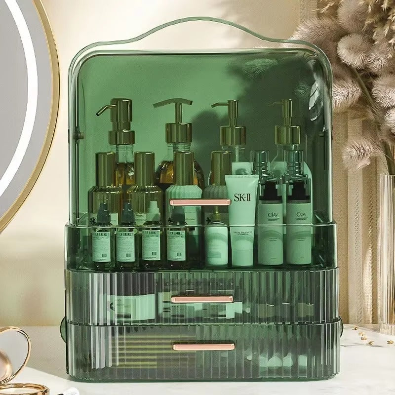 Green multi-tier makeup organiser with lid and clear tiered compartments for cosmetics