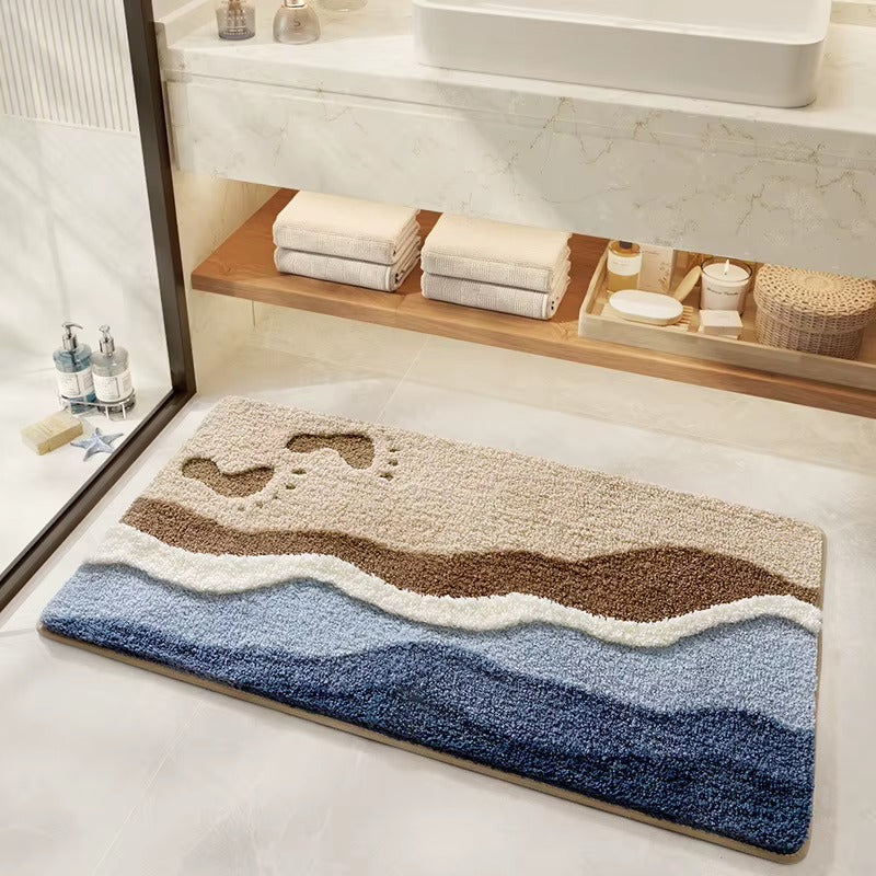 Fowey beach wave microfibre non-slip bath mat with footprint beach pattern, blue and brown