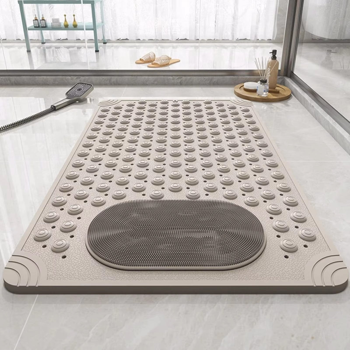 Non-slip shower mat with foot scrubber, light grey textured bumps and oval mesh pad