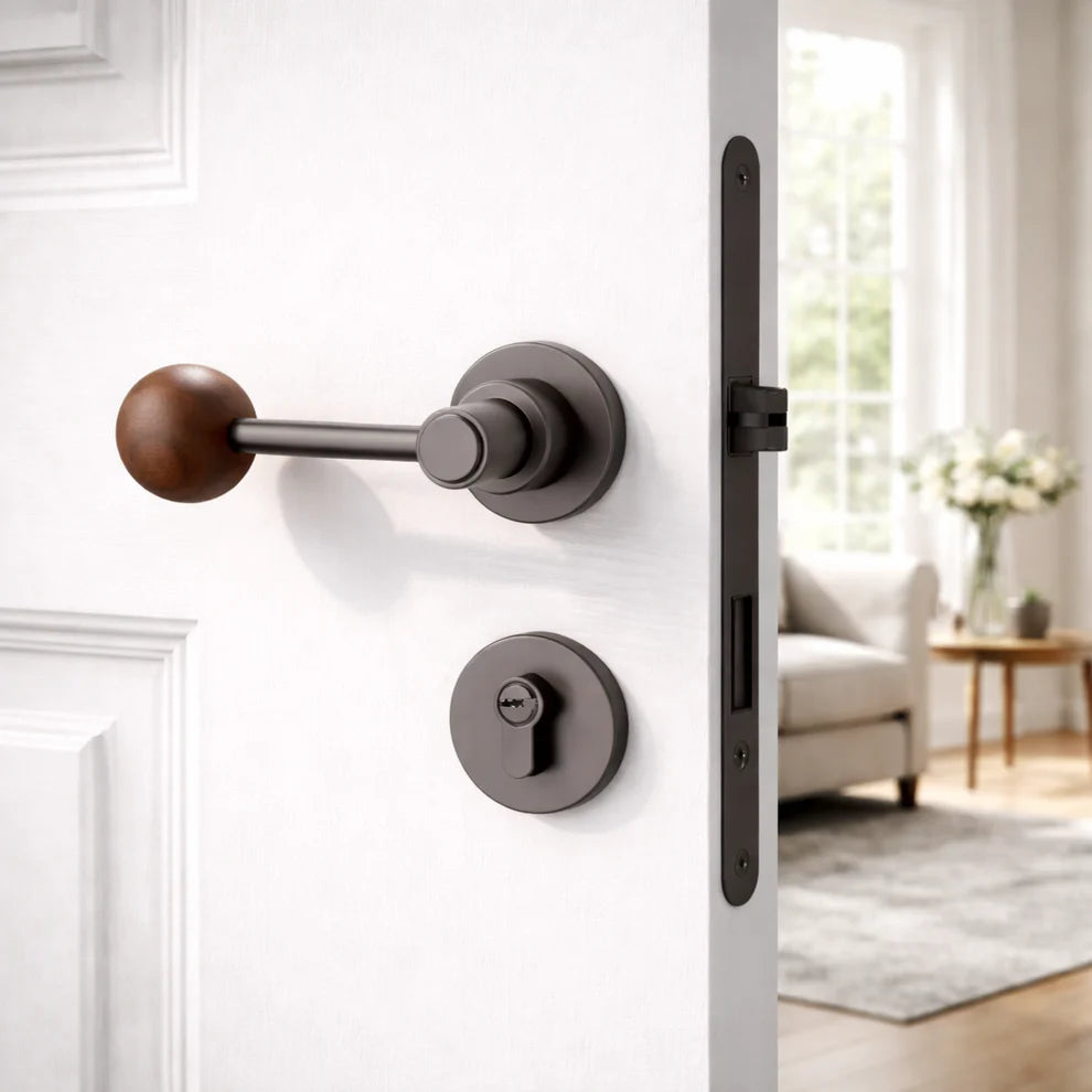 Split door lock handle with walnut ball lever and dark round backplates