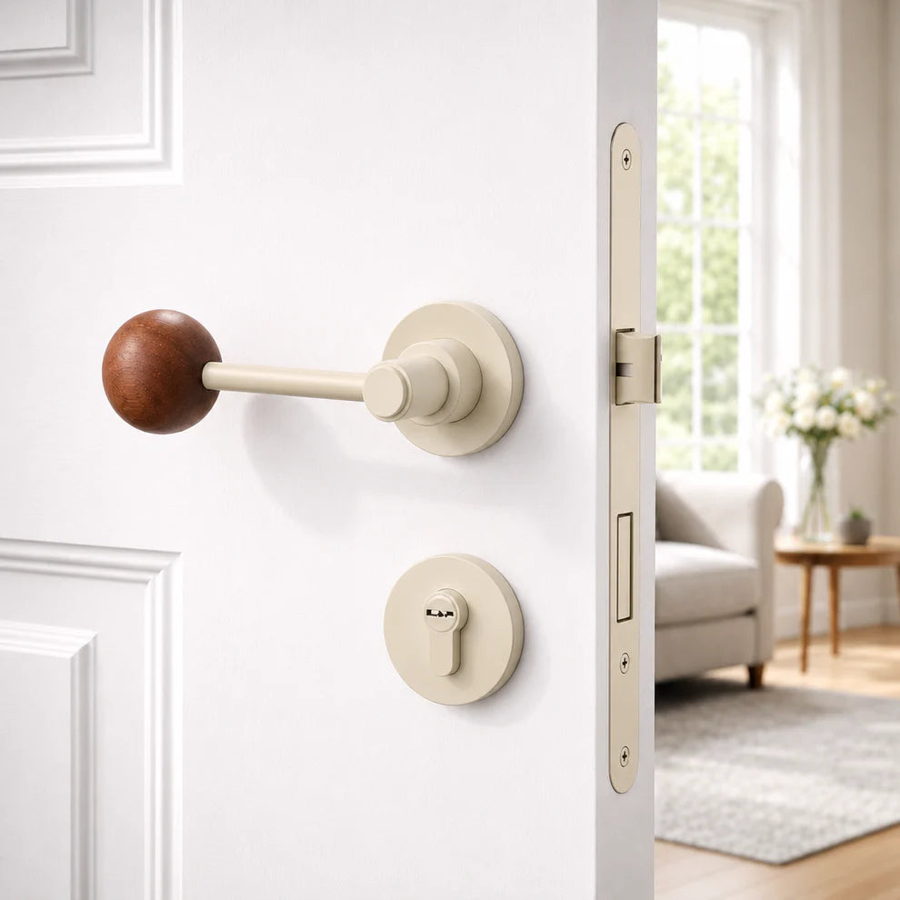 Split door lock handle with walnut ball lever and light beige backplates