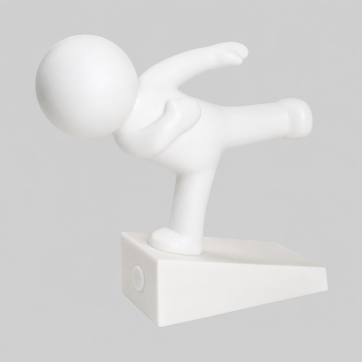 White playful character door stop in balancing pose, arms outstretched on a rectangular base