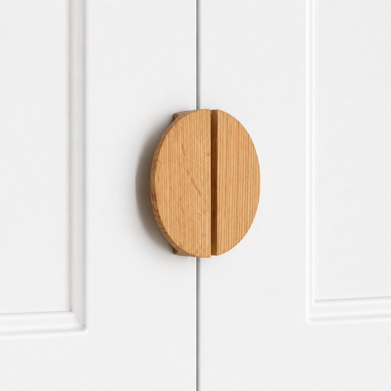 Tan wood semicircle cabinet pull handle with vertical grain and two-piece split center