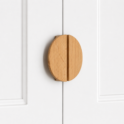 Tan wood semicircle cabinet pull handle with vertical grain and two-piece split center