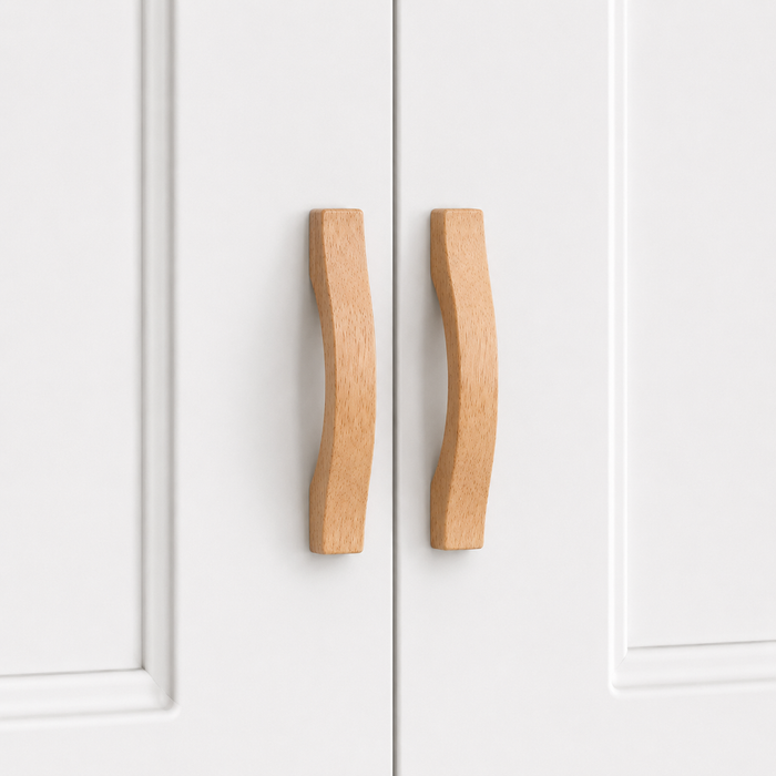 Wood cabinet handle, faceted pull shape in light natural finish