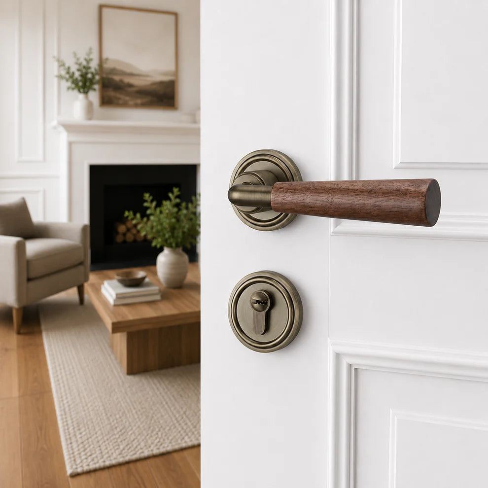 Interior door lock handle with brown wood lever and antique silver round rosettes