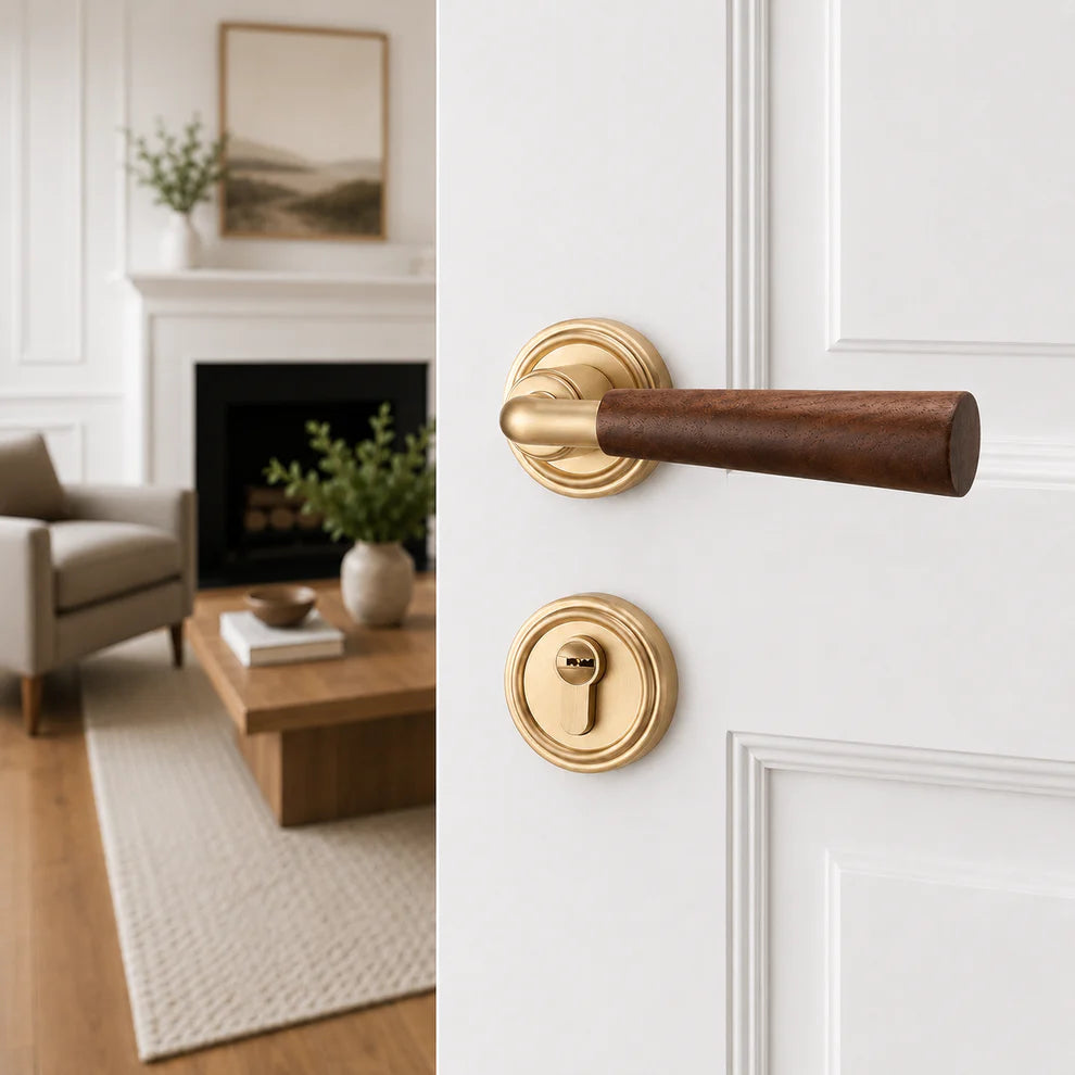 Interior door lock handle with brown wood lever and champagne gold round rosettes