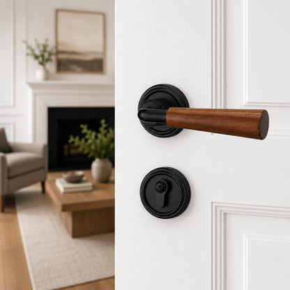 Interior door lock handle with brown wood lever and black round rosettes