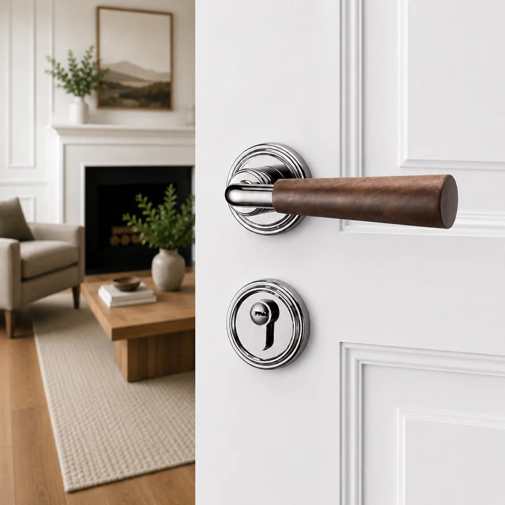 Interior door lock handle with brown wood lever and shiny silver round rosettes