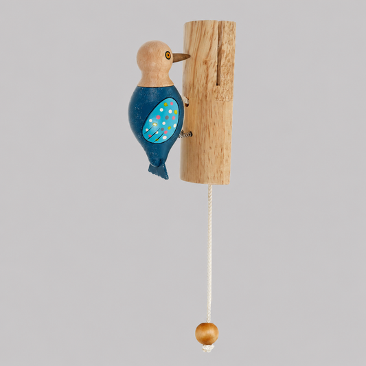 Novelty woodpecker door knocker: blue dotted body on light wood mount with hanging ball